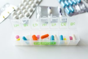 Photo Of Pills On Container