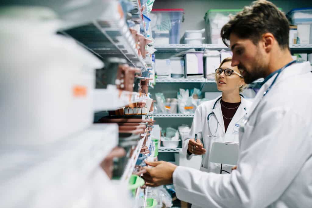 Pharmacy technicians working in a real world pharmacy