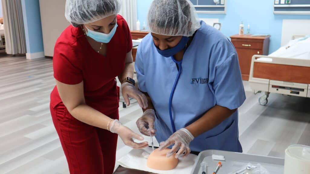 nursing assistant/home health aide student practicing injections