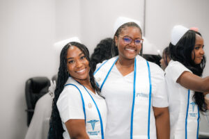 nursing student smiling walking toward elisabet perez