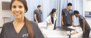 An instructor and students on campus doing hands-on practice