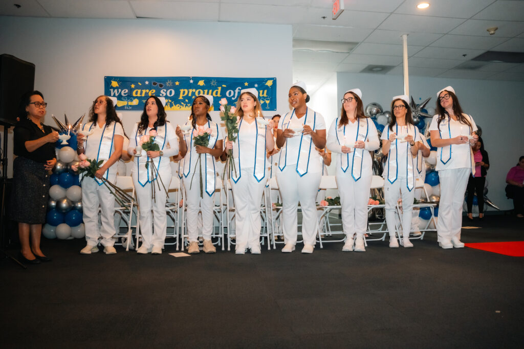 A group of FVI Miami nursing graduates at a pinning ceremony