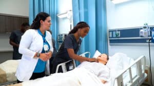FVI students participate in a a nursing assistant lab