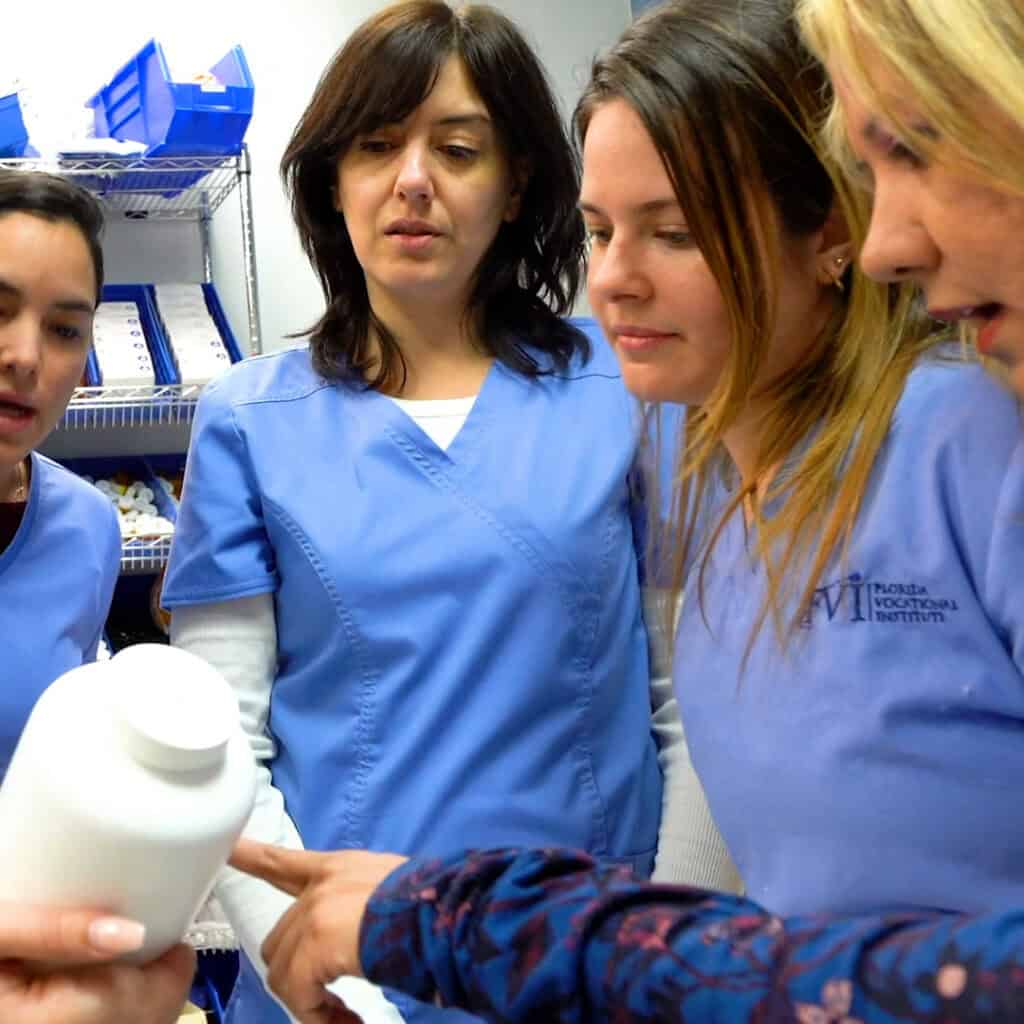 Miami Pharmacy tech program students working together