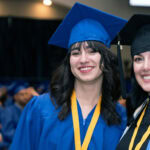 Two FVI graduates at a ceremony