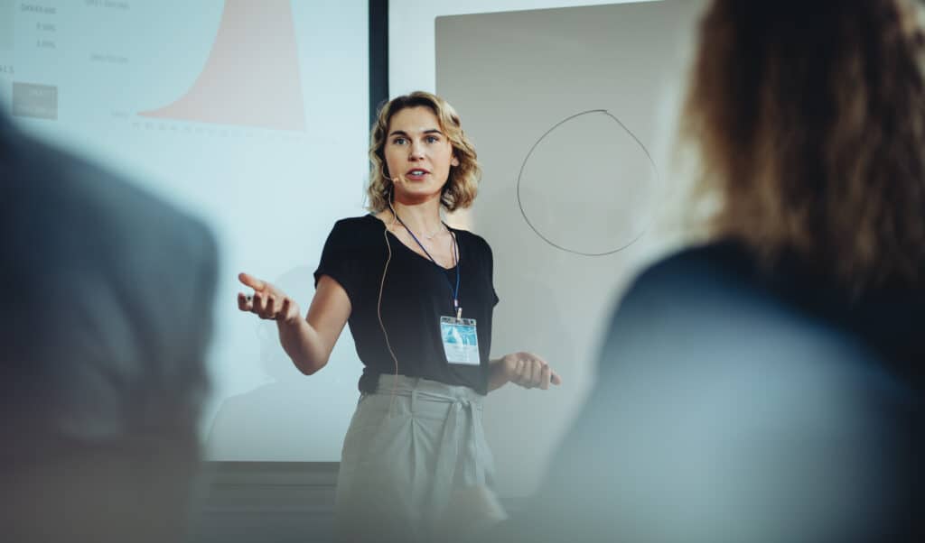 Jacqui Bryan presenting at a health coach clinic